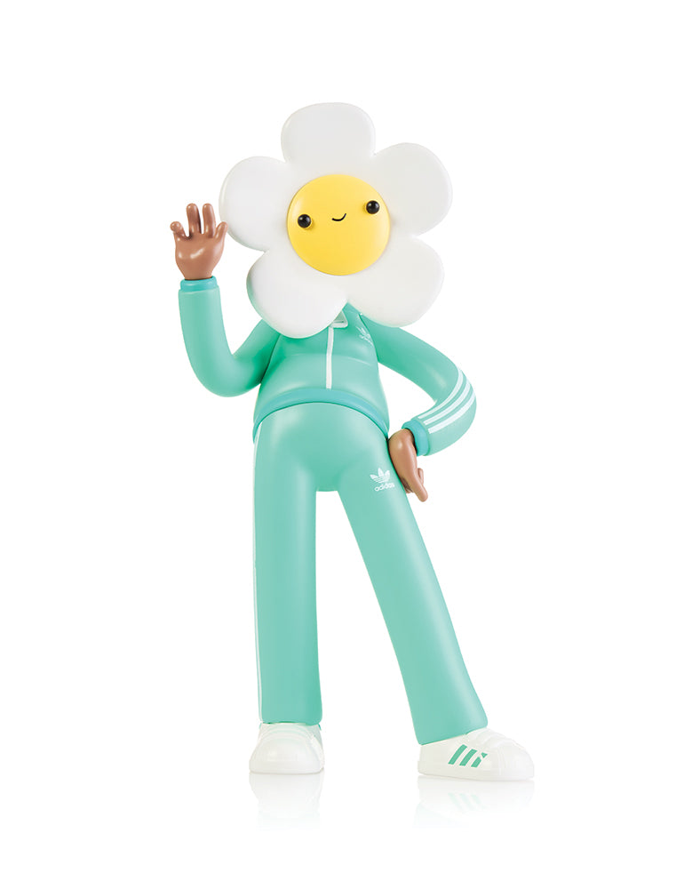 Deysi Vinyl figure in custom adidas Originals tracksuit and Superstar shoes, a collaboration between Doodles and adidas Originals. Front.