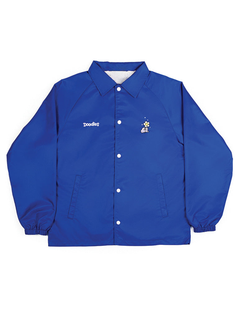 Bright blue Doodles Embroidered Emblem Coaches Jacket with snap-button front, elastic cuffs, and embroidered logo details on the chest.